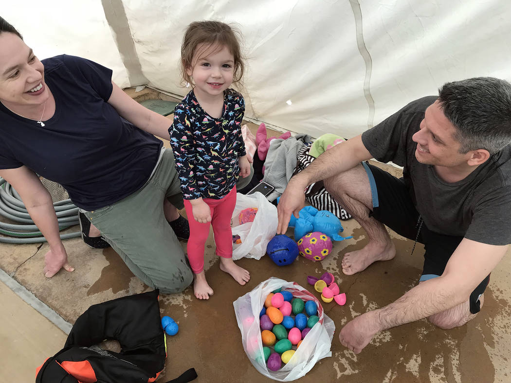 Hali Bernstein Saylor/Boulder City Review
The Sergent family, from left, Sophia, Genevieve and Shane, came to the municipal pool Saturday, March 17, 2018, for the third annual Easter Pool Plunge.