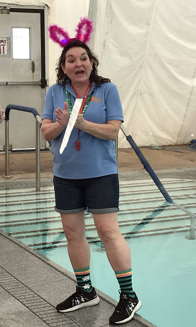 Hali Bernstein Saylor/Boulder City Review
Cheree Brennan, aquatic coordinator, explains how the Easter Pool Plunge will work before the start of the event on Saturday, March 17, 2018.