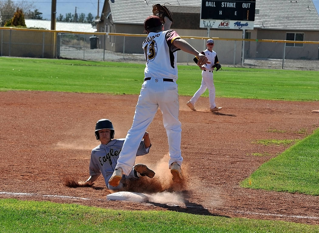 Horace Langford Jr./Pahrump Valley Times 
Boulder City High School freshman Troy Connell slides into third during the Eagles' game against Pahrump Valley on Tuesday. He batted in two run in the ga ...