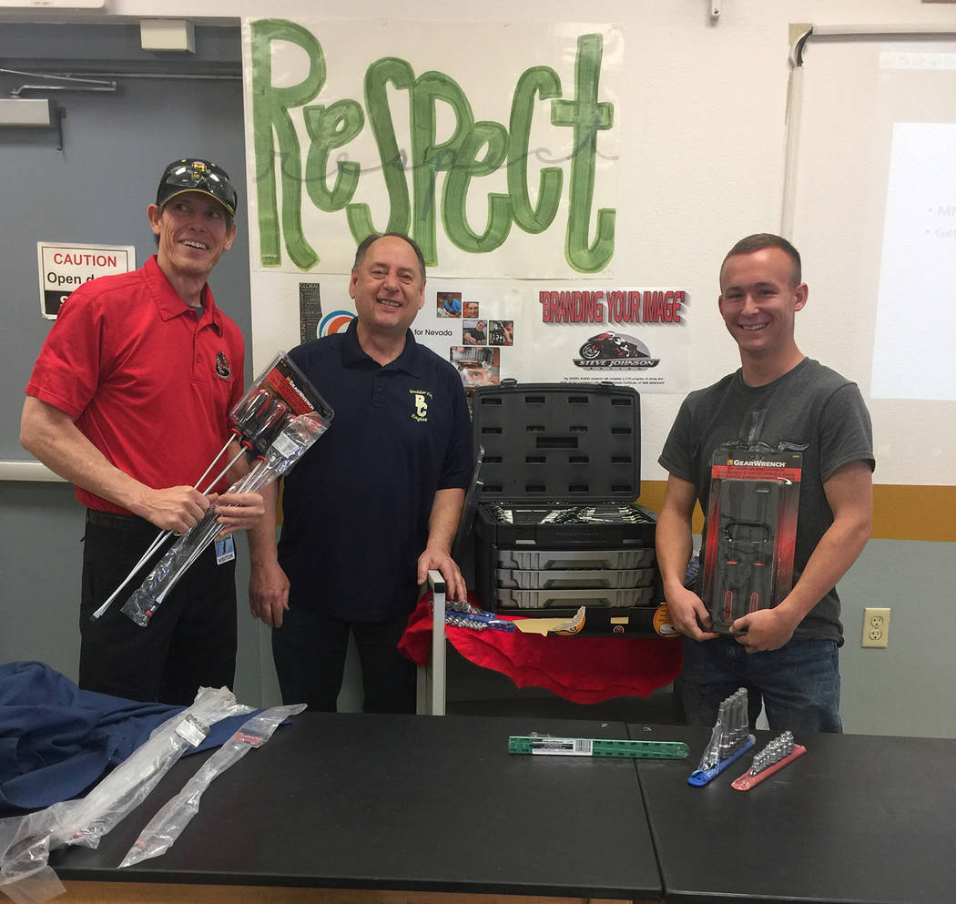 Boulder City High School
Logan Heisler, right, a senior at Boulder City High School, was presented with an assortment of tools by Steve Johnson, left, of Steve Johnson Racing as the 2018 recipient ...