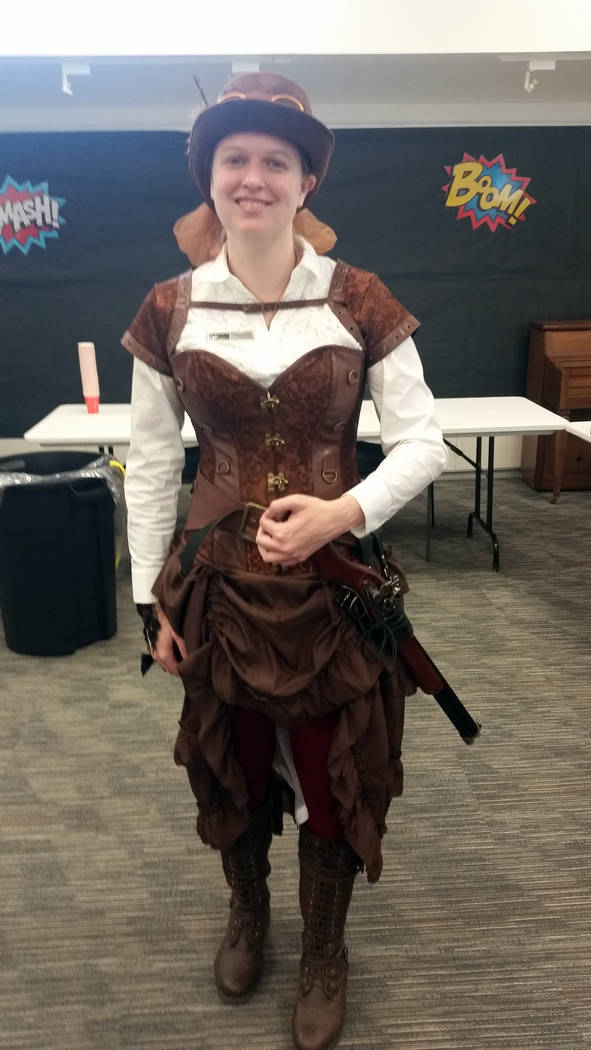 Celia Shortt Goodyear/Boulder City Review Samantha Bigger, head of information services at the Boulder City Library, dressed in historical attire for the cosplay portion of Superhero Saturday on S ...