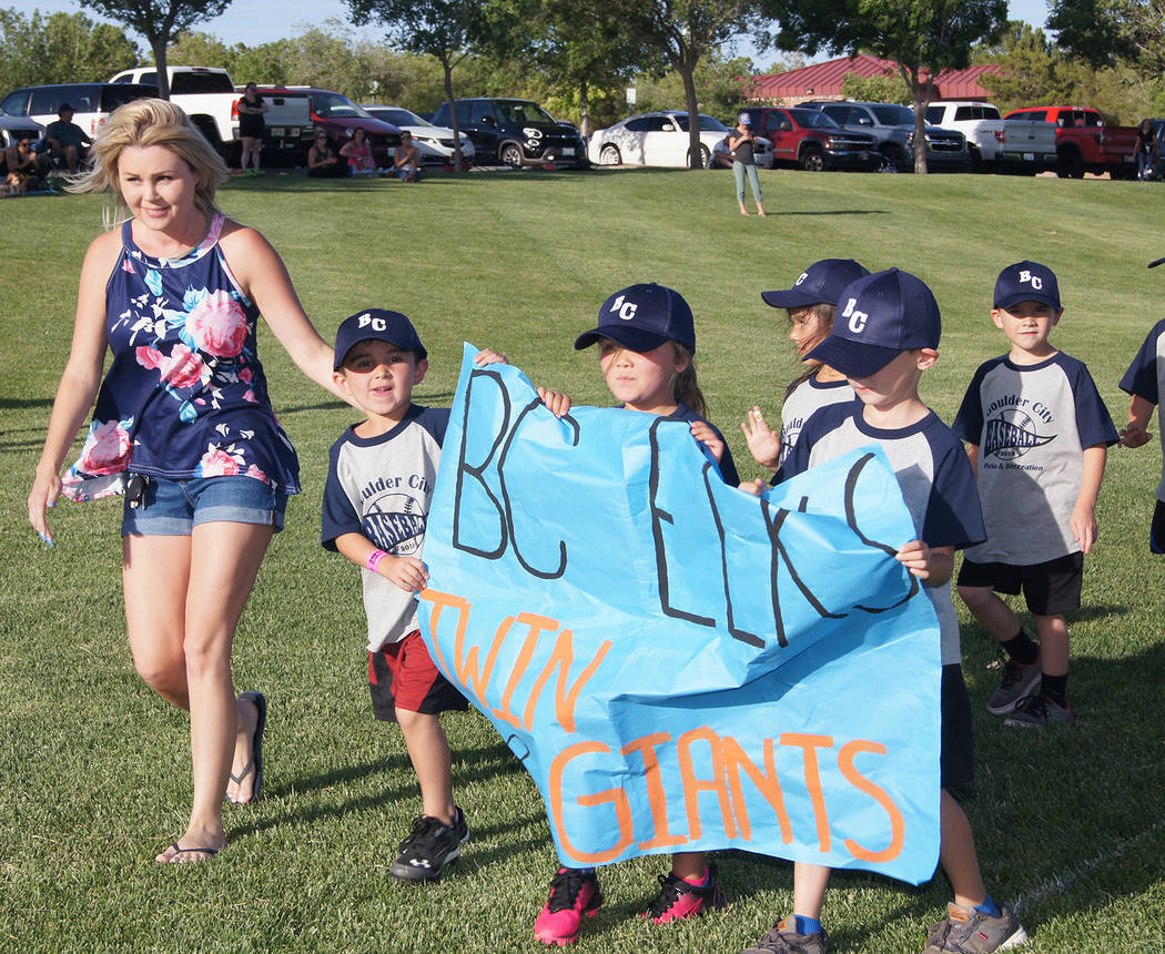 Kelly Lehr One of Boulder City Parks and Recreation Department's youth ball leagues thanks its sponsor during recent opening ceremonies for the summer session.