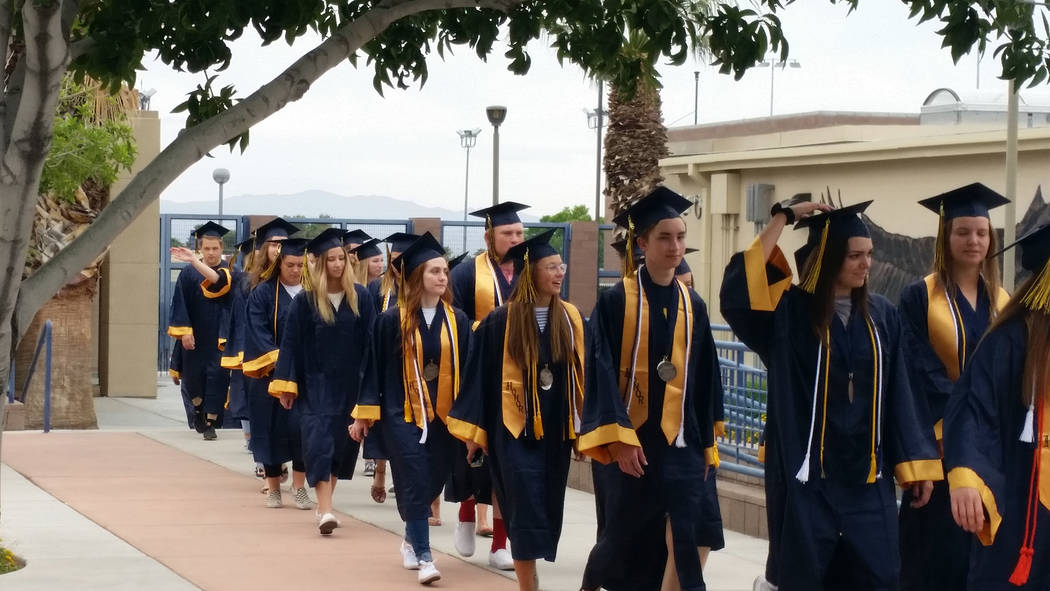 Celia Shortt Goodyear/Boulder City Review Members of the Boulder City High School's class of 2018 walk through campus on Monday, May 21, as they prepare to graduate and say goodbye to teachers and ...