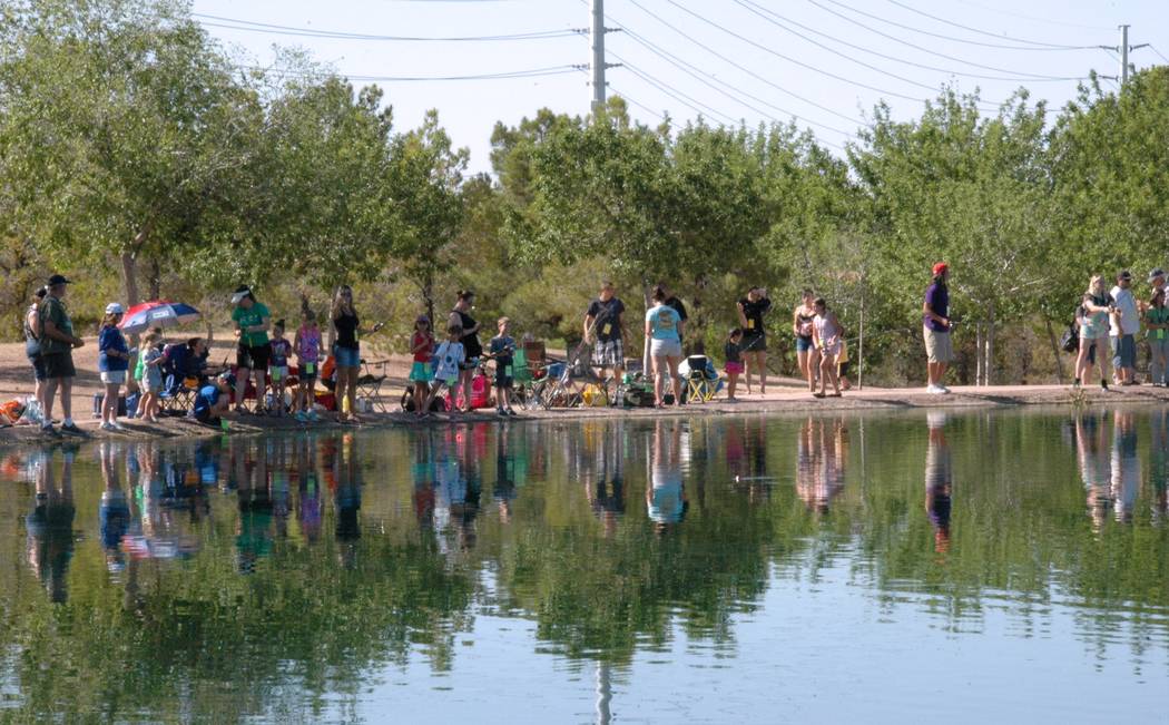 Jayme Sileo/Boulder City Review The cheers of families and amateur anglers catching their first fish sounded around Veterans' Memorial Park's pond during Free Fishing Day on Saturday.