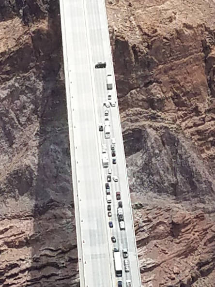 Arizona Department of Public Safety Matthew Wright of Henderson blocks the southbound lanes on the Mike O’Callaghan-Pat Tillman Bridge near the Hoover Dam on Friday.