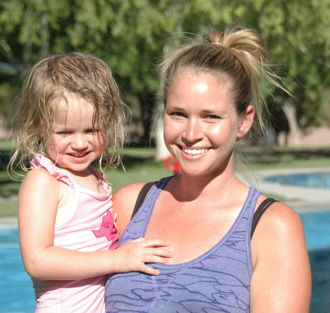 Jayme Sileo/Boulder City Review Shawna Haak, 31, of South Dakota, holding her daughter, Charlotte, plans to spend much of the summer swimming and do some traveling.