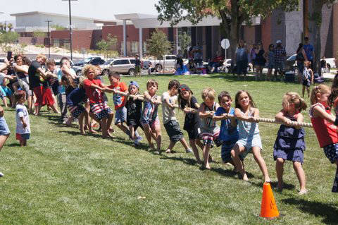 Roger Hall Children give their all in the tug-o-war contest that was part of the Damboree festivities in Broadbent Park on July 4.