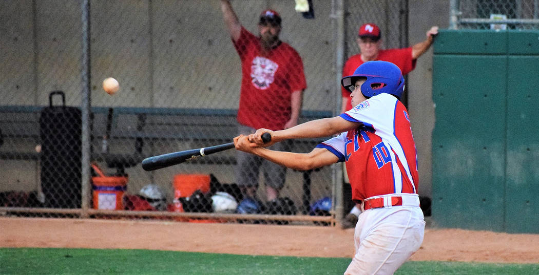 Robert Vendettoli/Boulder City Review Chase Calvez of the Boulder City Little League Junior All-Stars lines a shot to left field against the Henderson All-Stars on July 12, 2018, in the District I ...