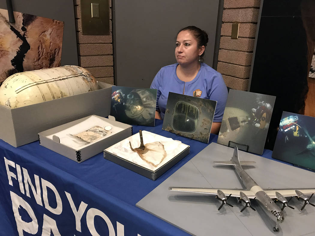 Hali Bernstein Saylor/Boulder City Review Erin Eichenberg, an archaeologist for the National Park Service, answered questions about three artifacts - an oxygen canister, piece of fuselage skin and ...