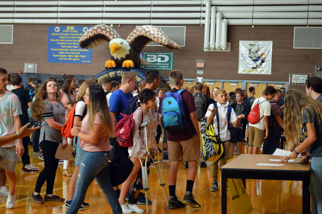 Celia Shortt Goodyear/Boulder City Review Freshmen line up in the Boulder City High School gymnasium on Monday for their orientation on the first day of school.