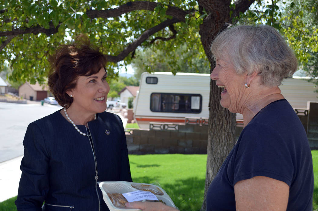 Celia Shortt Goodyear/Boulder City Review U.S. Rep. Jacky Rosen delivers food to Boulder City resident Patricia DeShazo on Aug. 16. Rosen was delivering food with Boulder City's Meals on Wheels to ...