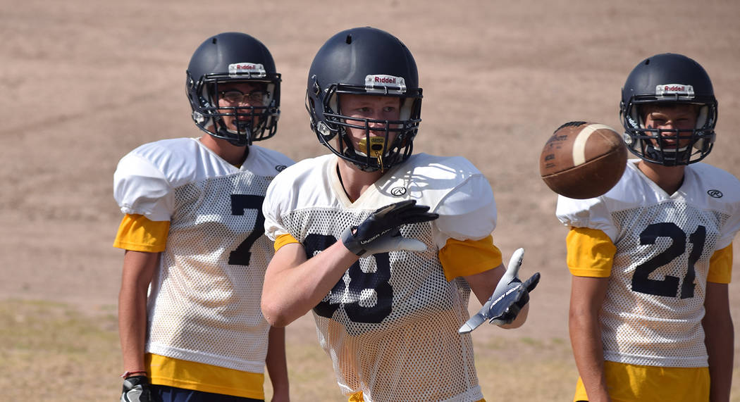 Robert Vendettoli/Boulder City Review Matt Morton, center, a sophomore at Boulder City High School, is expected to help lead a group of underclassmen in the football team's passing attack this season.