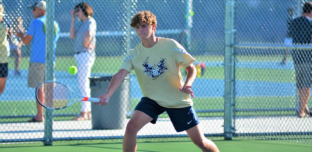 Robert Vendettoli/Boulder City Review Boen Huxford, a junior at Boulder City High School, went 2-0 in doubles play with Preston Jorgensen against Virgin Valley on Aug. 29 to help the Eagles win th ...