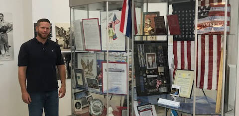 Susan Mitchell Ryan Stankovic helped the Mitchell Stankovic family carry on its 15-year tradition of creating a display about the Constitution in the rotunda at the Boulder City Library. The displ ...