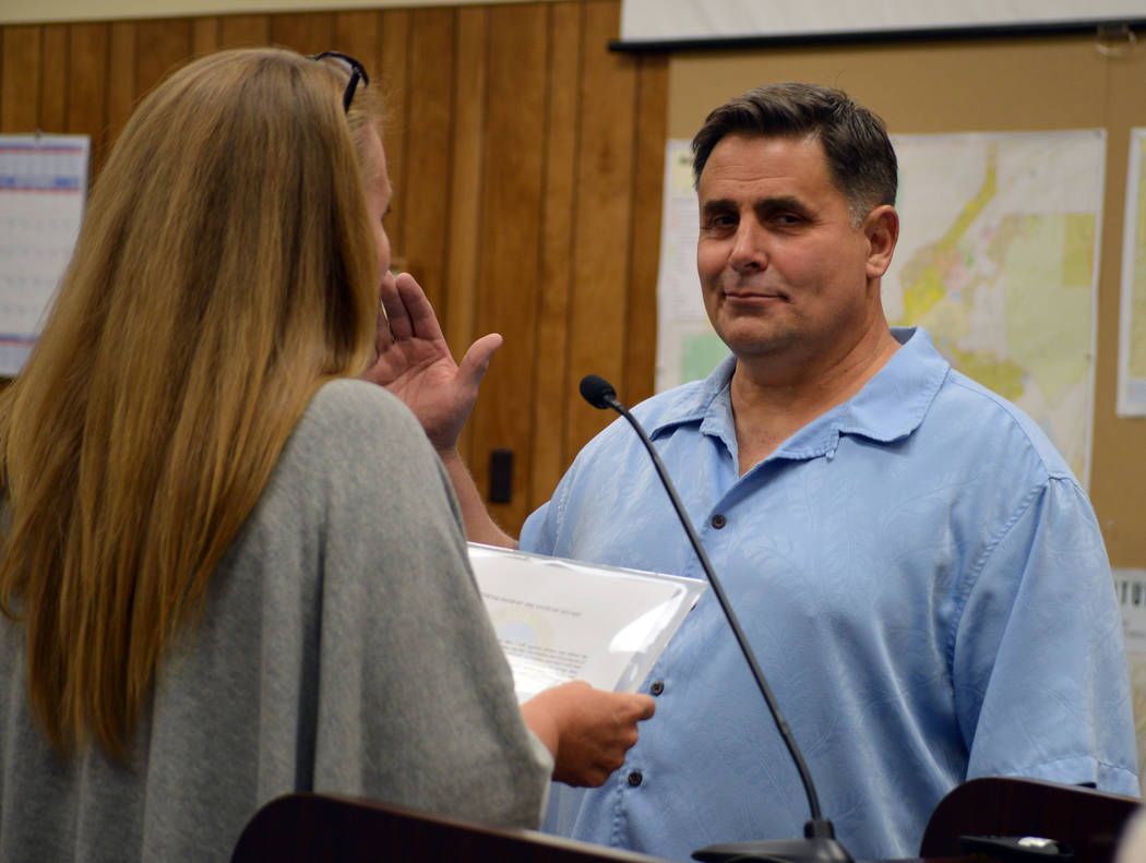 Celia Shortt Goodyear/Boulder City Review Bill Wilson is sworn into the Parks and Recreation Commission by City Clerk Lorene Krumm at the City Council meeting Tuesday, Sept. 11.