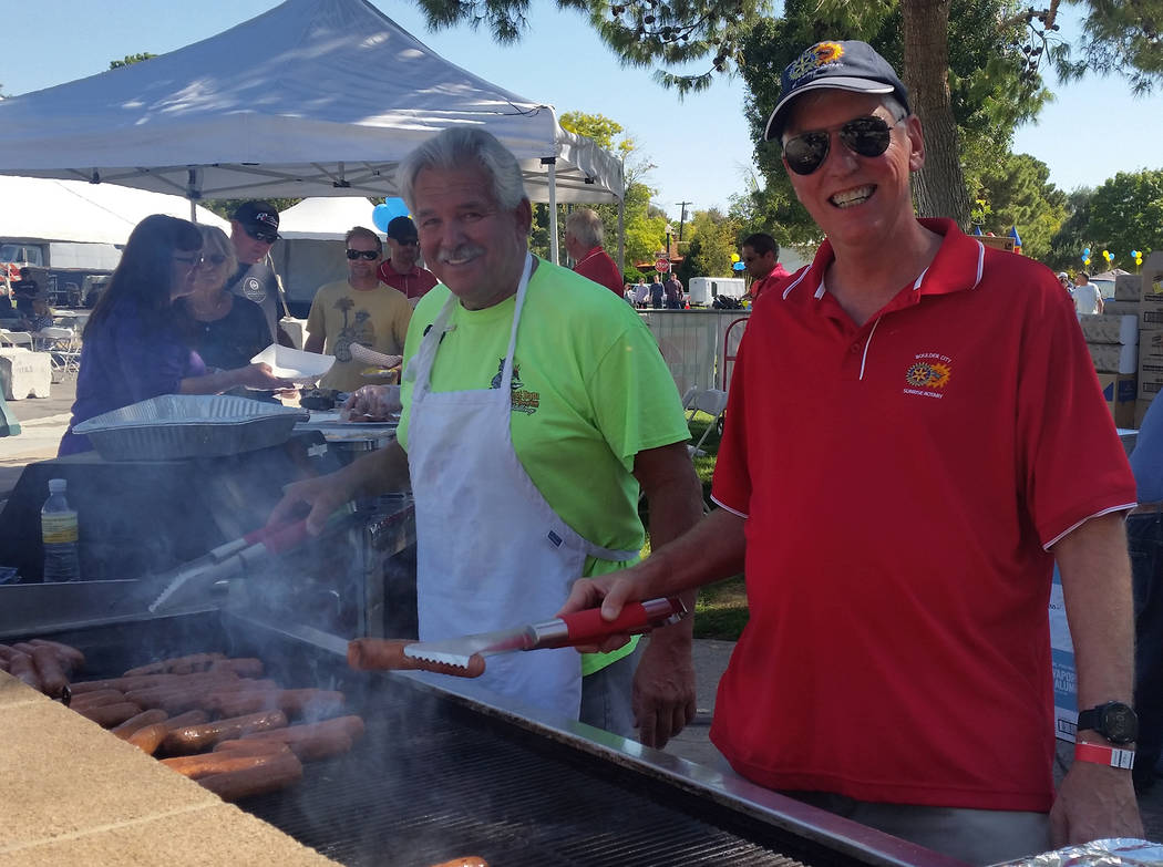 File Dale Ryan, left, and Robert Merrell grill bratwursts and beef hot dogs at the 21st annual Wurst Festival in 2017. This year's event will be held from 10 a.m. to 10 p.m. Saturday, Sept. 29.