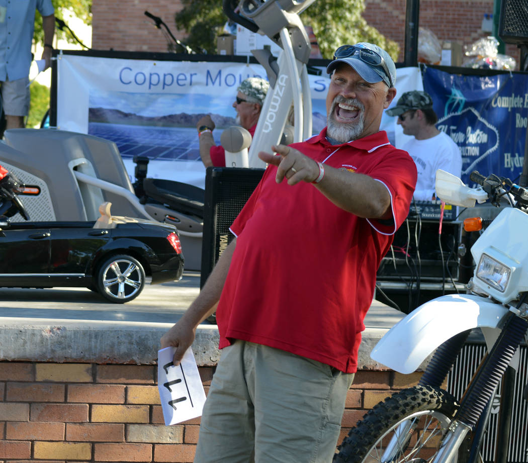 File Scott Hinson spots a bid during the live auction during the Boulder City Sunrise Club's 21st annual Wurst Festival in 2017. This year's festival starts at 10 a.m. Saturday.