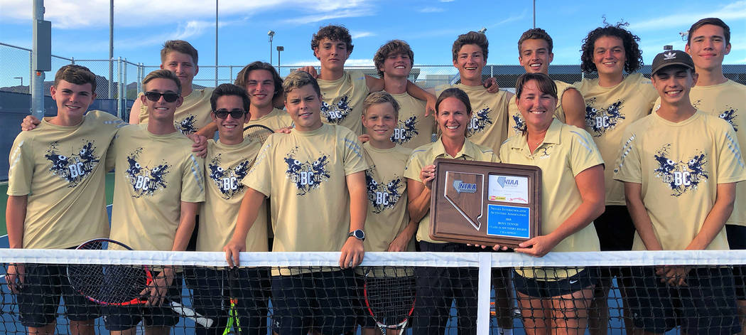 Amy Wagner Members of Boulder City High School's boys tennis team celebrate their regional championship win over The Meadows on Friday, Oct. 5, 2018.