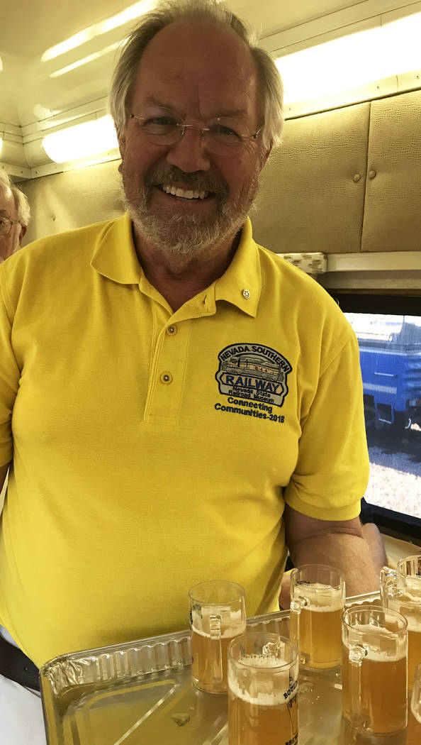 Hali Bernstein Saylor/Boulder City Review Randy Hees, director of the Nevada State Railroad Museum in Boulder City and member of the Boulder City Sunrise Club, served samples of the Hell's Hole He ...