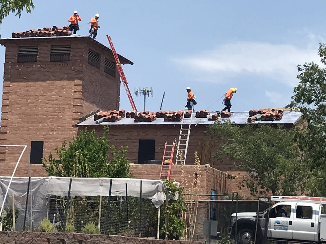 Hali Bernstein Saylor/Boulder City Review Earlier this year, workers installed a new roof on the water filtration plant on Railroad Avenue. More than 100 tiles were salvaged and two local nonprof ...