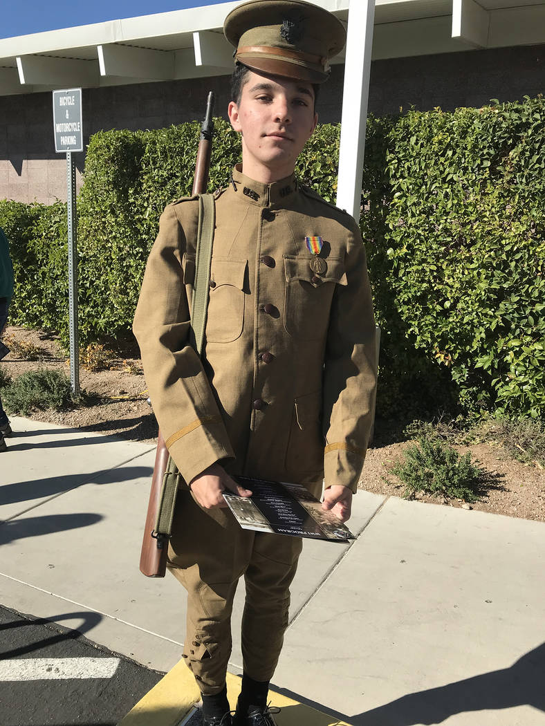 (Hali Bernstein Saylor/Boulder City Review) Dylan Signore, 15, a student at Rancho High School, dressed in a World War I military uniform as the 100th anniversary of the armistice was recalled dur ...