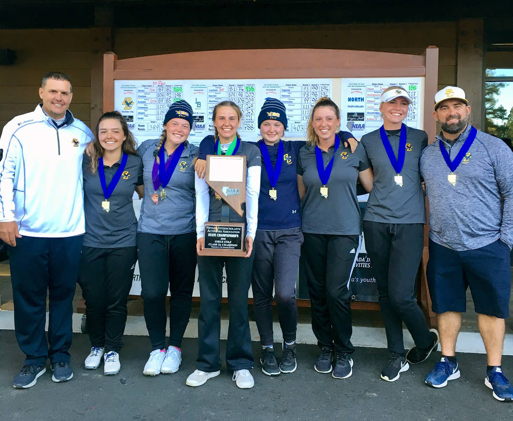 (Kelly Reese) Members of the Boulder City High School girls varsity golf team celebrate winning back-to-back state championships after an undefeated season.