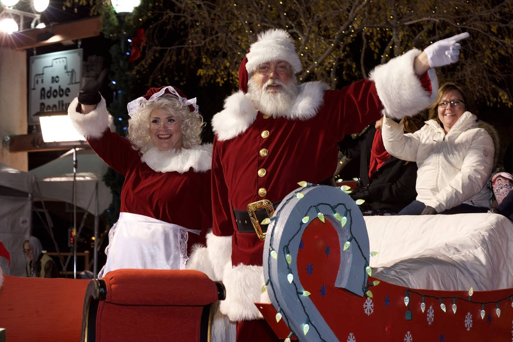 Santa and Mrs. Claus provide a traditional end to Santa's Electric Night Parade, which begins at 4:30 p.m. Saturday, Dec. 1.