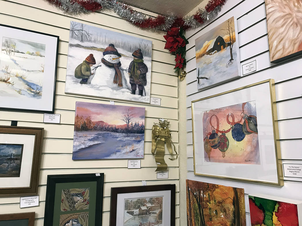 (Hali Bernstein Saylor/Boulder City Review) Members of Boulder City Art Guild have decked their walls with holiday and winter scenes for this month's showcase exhibit. The gallery is inside the Bo ...