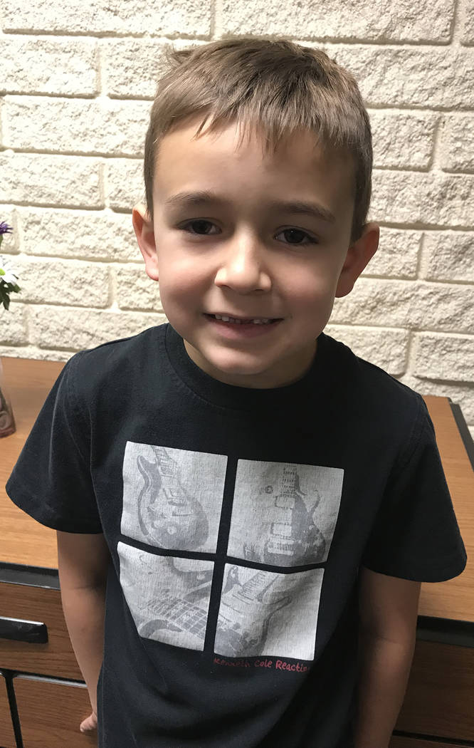 (Hali Bernstein Saylor/Boulder City Review) Michael Martorano, 6, a first-grader at Mitchell Elementary School in Boulder City said his favorite Christmas present was a bow and arrow because he li ...