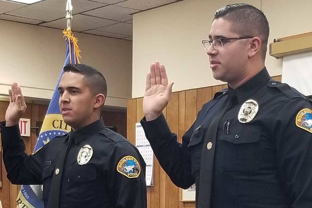 Celia Shortt Goodyear/Boulder City Review Kenny Calzada, left, and Kevin Barakat were sworn in as Boulder City Police officers Thursday, Dec. 13.