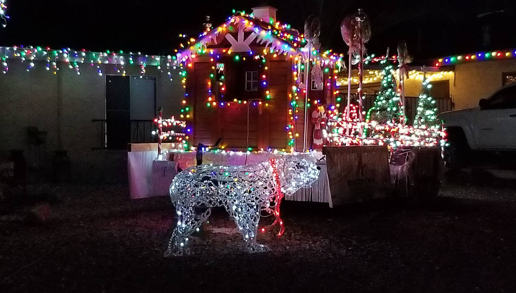 (Celia Shortt Goodyear/Boulder City Review) This home on Del Prado Drive includes lights and Santa's workshop.