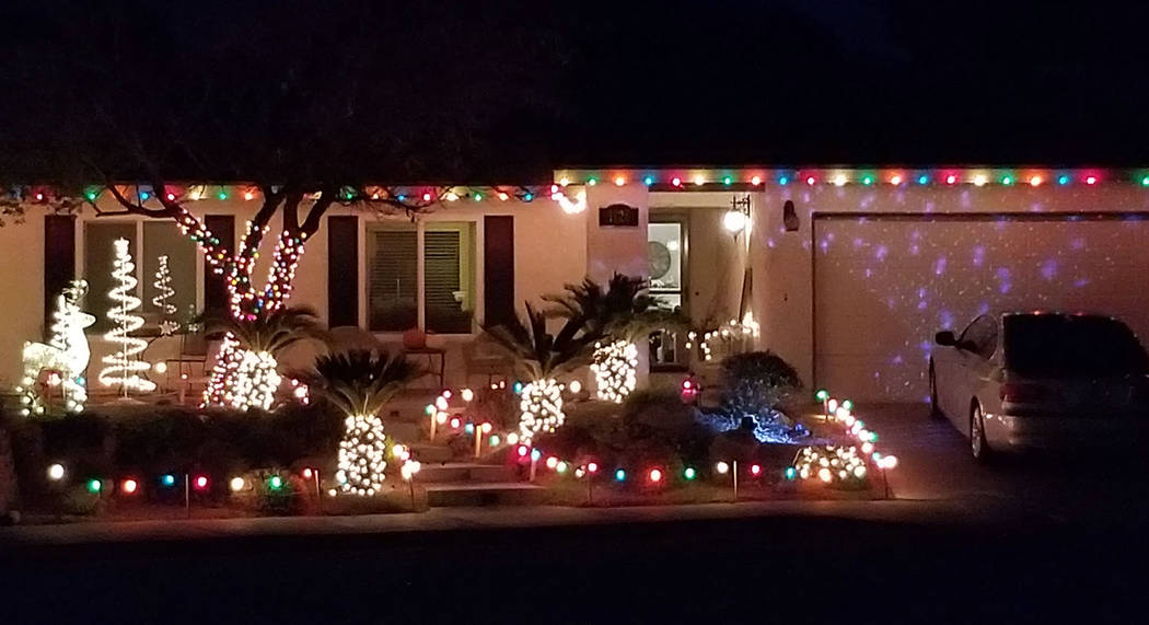 (Celia Shortt Goodyear/Boulder City Review) This home on Lillo Court includes Christmas lights and a llama.