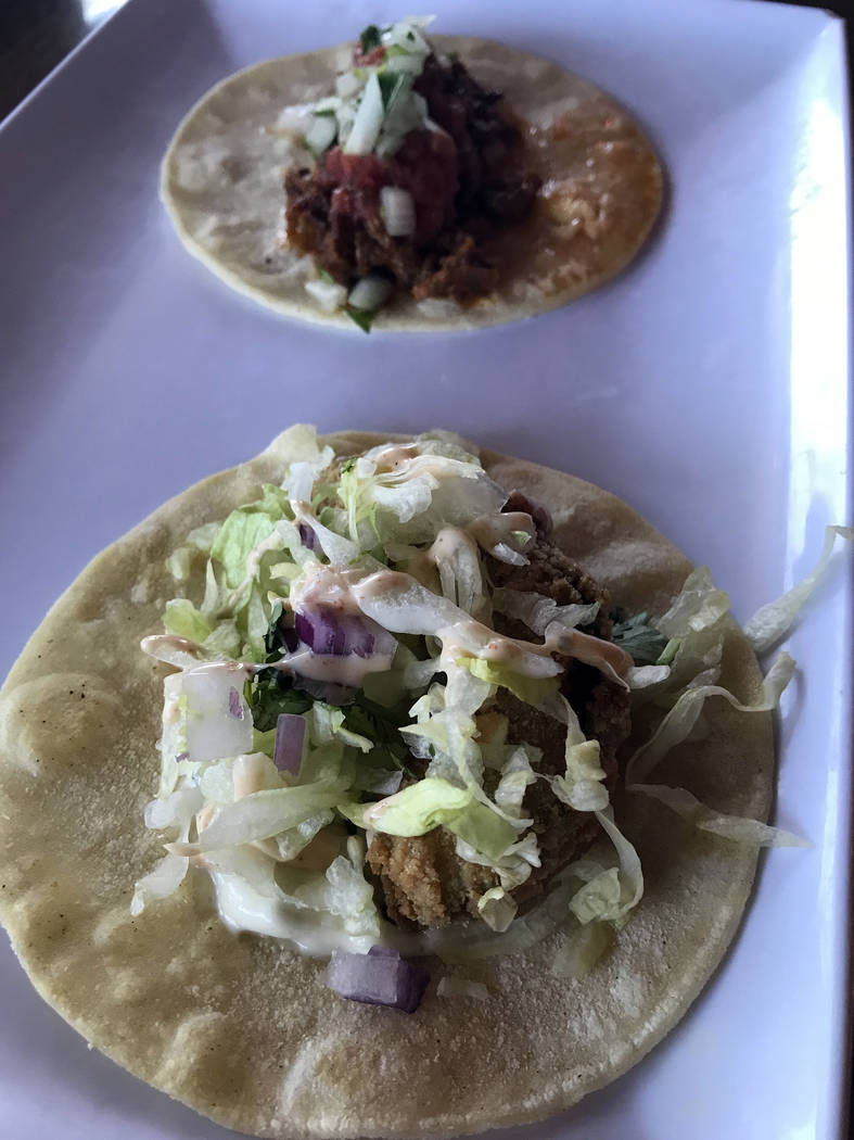 Hali Bernstein Saylor/Boulder City Review The Tap offers a fried avocado street taco on its Taco Tuesday menu. It is served on a corn tortilla and topped with lettuce, red onions and cilantro lime ...