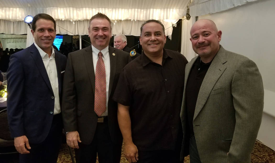 (Celia Shortt Goodyear/Boulder City Review) Jim Ferrence, from left, City Manager Al Noyola, Mike Pacini and Rob Martello take time out for a quick picture at the mayor's State of the City address ...