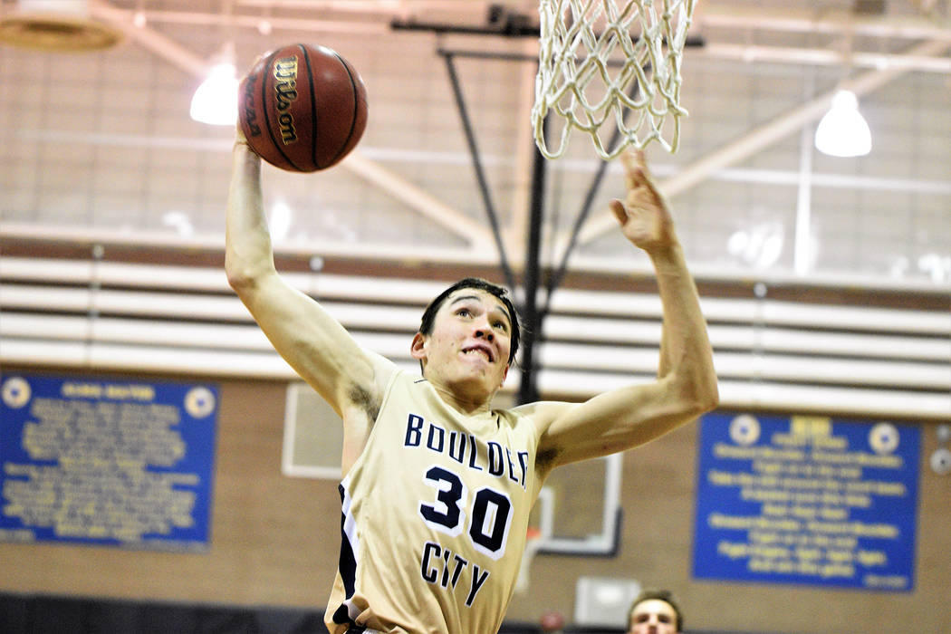 (Robert Vendettoli/Boulder City Review) Boulder City High School sophomore Ethan Speaker goes up for a thunderous dunk against Somerset Academy Sky Pointe on Monday, Feb. 4, 2019. The Eagles won 8 ...