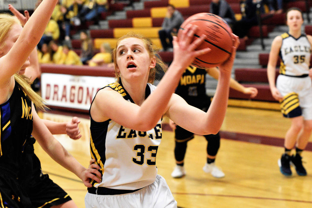 (Robert Vendettoli/Boulder City Review) Making her way inside the paint, junior forward Ellie Howard backs down her opponent against Moapa Valley on Monday, Feb. 25, in the 3A Southern Region fina ...