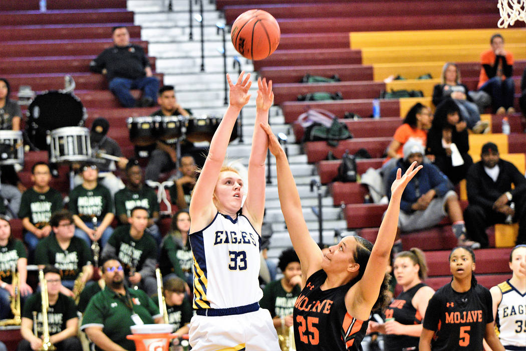 (Robert Vendettoli/Boulder City Review) Boulder City High School's junior forward Ellie Howard, seen rising above a Mojave defender in the 3A Southern Region semifinals Feb. 23, 2019, was named th ...