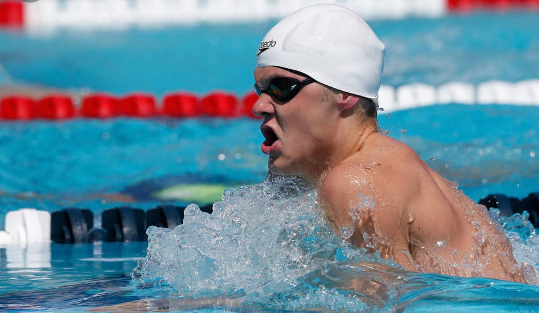 (File) Boulder City High School senior A.J. Pouch, seen swimming the 200-meter breaststroke in August at the Speedo Junior Nationals in Irvine, California, is gearing up for a run at the state cha ...