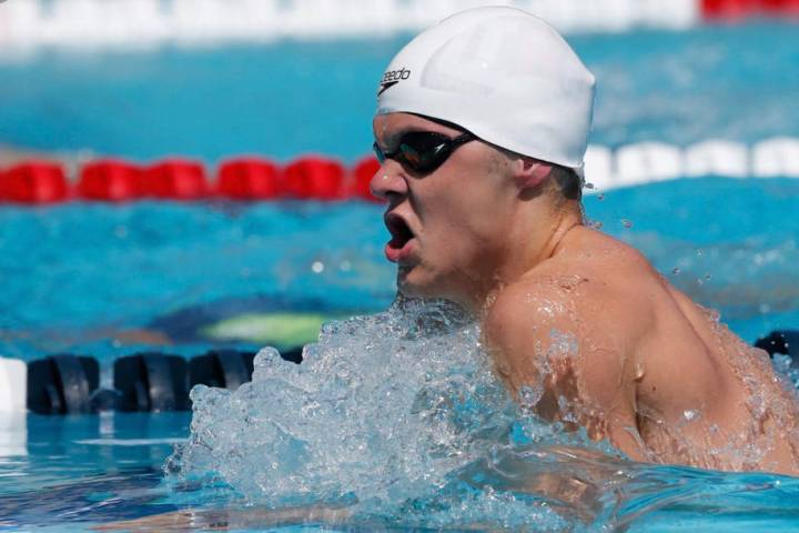 (File) Boulder City High School senior A.J. Pouch, seen swimming the 200-meter breaststroke in August at the Speedo Junior Nationals in Irvine, California, is gearing up for a run at the state cha ...