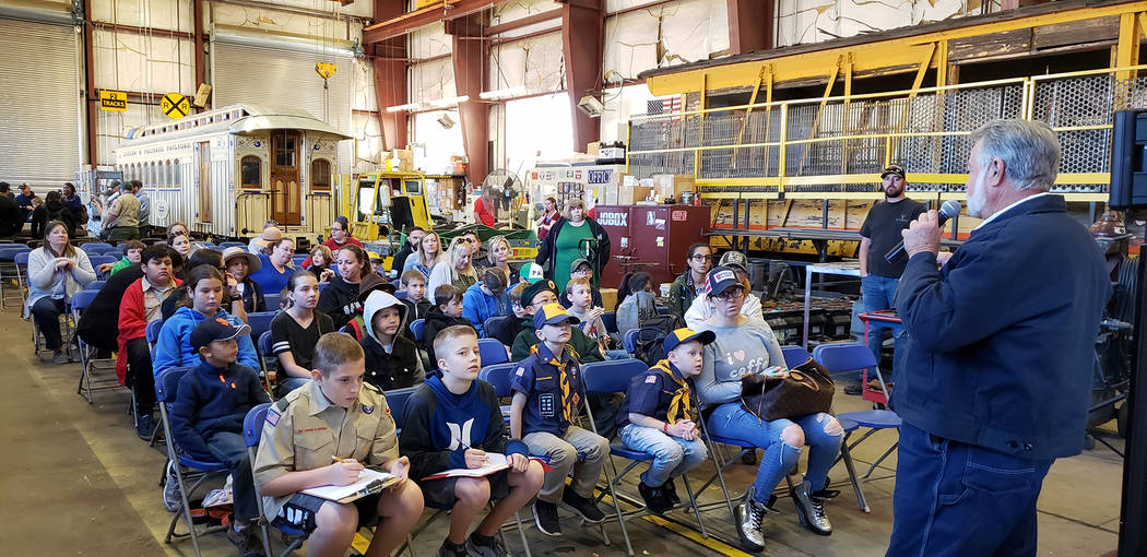(Nevada State Railroad Museum) Rowland Fogarty, right, a retired Union Pacific engineer, discussed railroading careers with Scouts on Saturday, March 16, 2019, as they visited the Nevada State Rai ...