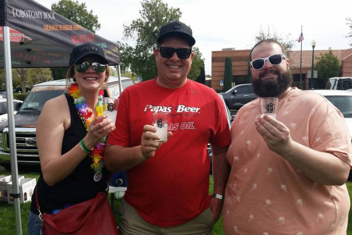 Friends from Kingman, Arizona, from left, Jenna Harnisch, Jeff Hoehne and Joe Fellers, enjoy th ...