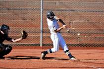 (Robert Vendettoli/Boulder City Review) Senior Jimmy Dunagan hits a line drive up the middle ag ...