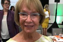 (Hali Bernstein Saylor/Boulder City Review) Linda Faiss of Boulder City holds the award she was ...