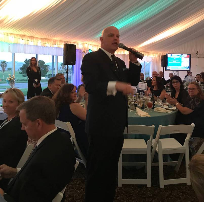 Chet Buchanan served as the auctioneer at Boulder City Hospital Foundation's Heart of the Commu ...