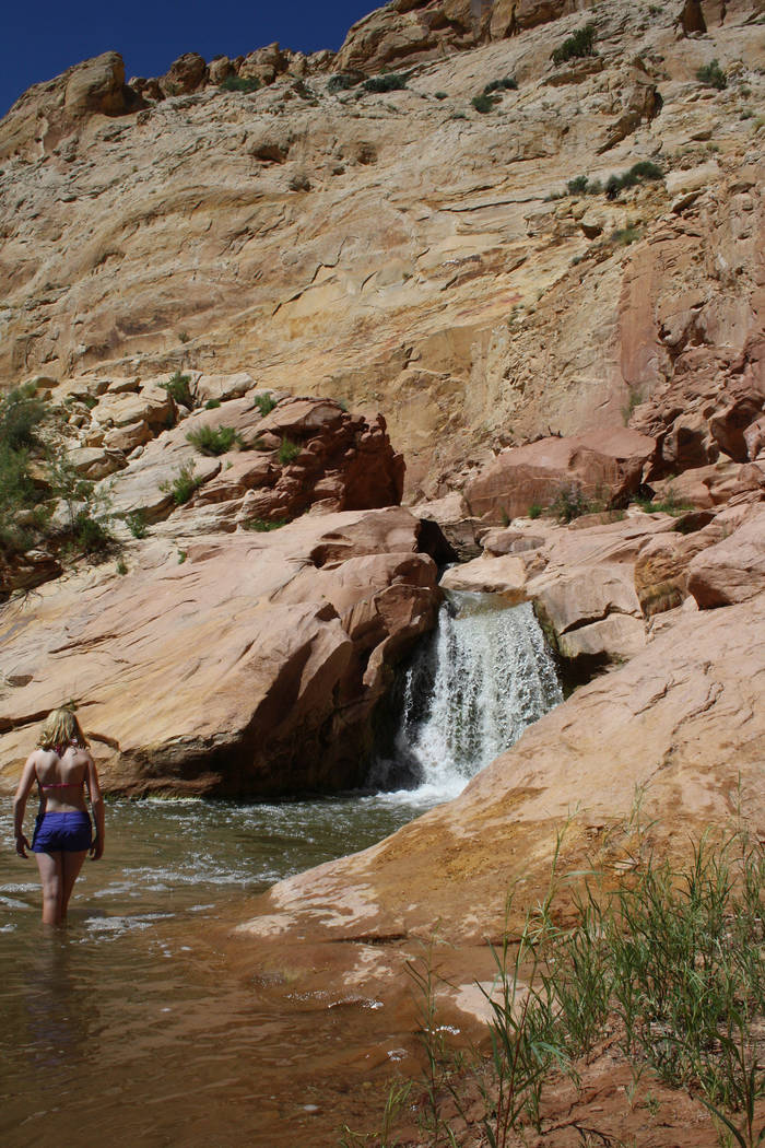 (Deborah Wall) A small waterfall can be found along the Fremont River on Utah State Route 24 in ...
