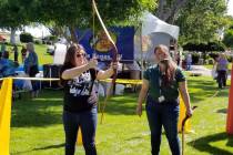 (Celia Shortt Goodyear/Boulder City Review) Amanda Yardley, left, learns how to use a bow and a ...