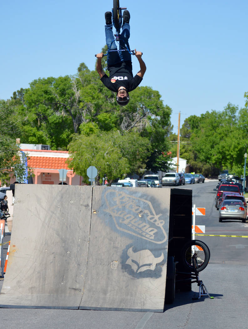 (Celia Shortt Goodyear/Boulder City Review) Aidin Fly performs a flip on his bike during the 42 ...