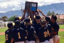 (Daphne Brownson) Members of Boulder City High School's baseball team celebrate winning the reg ...