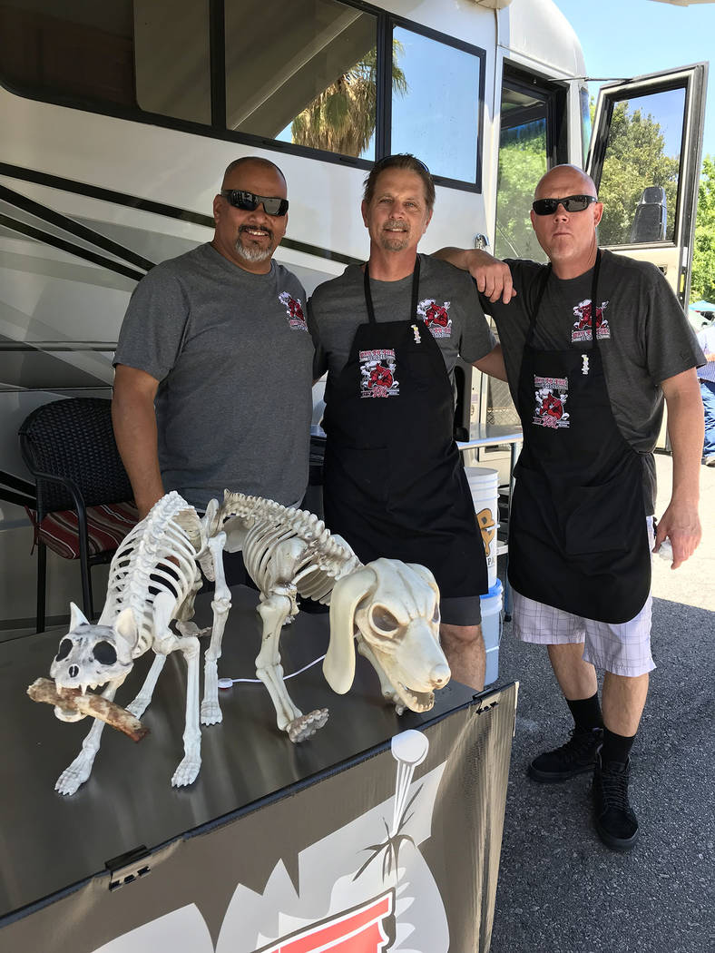 (Hali Bernstein Saylor/Boulder City Review) Members of the Bad to the Bone barbecue team, which ...