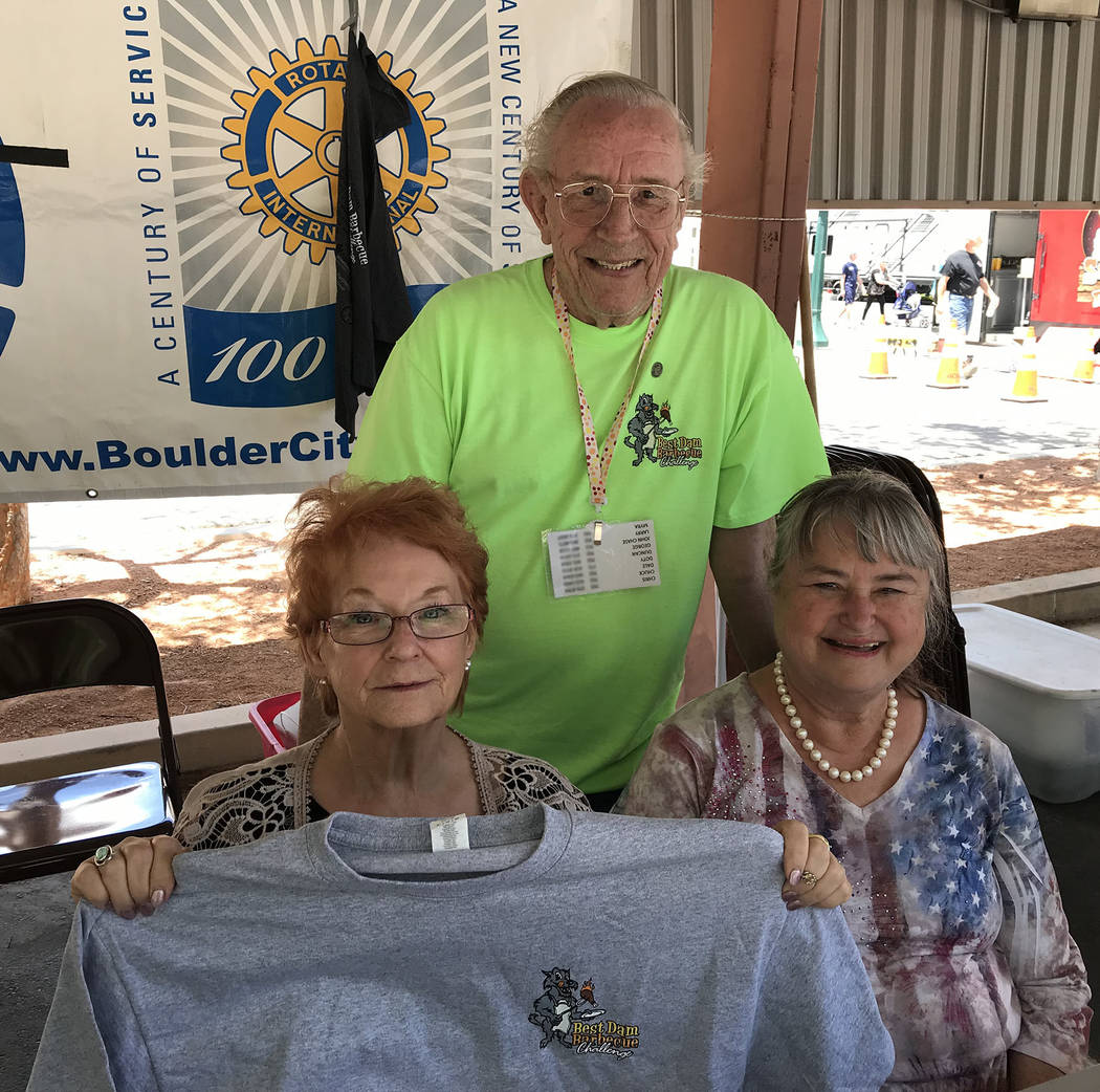(Hali Bernstein Saylor/Boulder City Review) Manning the information booth at the Best Dam Barbe ...